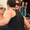 Orlando Bloom kisses Kim Kardashian after Katy Perry 'split' as they enjoy Jeff Bezos and Lauren Sanchez's $20M Venice wedding party - after he was caught 'checking her out'