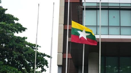 Myanmar's military leader puts in rare appearance at event honoring Aung San Suu Kyi's father