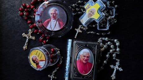 AP PHOTOS: Holy tchotchkes: Rome is awash with papal souvenirs