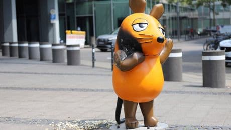 Vandals set fire to a mouse statue that's a TV star and mascot for a German broadcaster