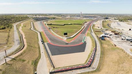 Stunning £950,000 apartment put up for sale at iconic race track with room for EIGHT cars… but no bedroom