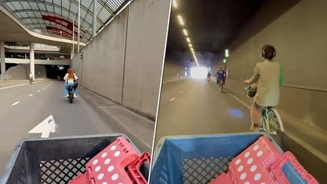 Bijzonder moment: reizigers fietsen door autotunnel bij Amsterdam CS door Sail