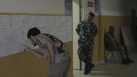 Battered by war and economic crisis, Lebanon holds first local elections in almost 10 years