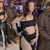 Pregnant Rihanna shows off her baby bump in a racy cut-out dress that flaunts her legs as she steps out with partner A$AP Rocky in Cannes