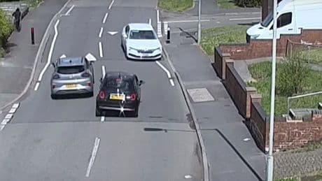 Shock moment drunk Fiat 500 driver smashes into car and flips over during dangerous overtake on quiet residential street