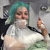 Hero aunt, 32, is left with gaping wounds after using herself as a 'human blanket' to save her four-year-old niece's life when dog launched at them