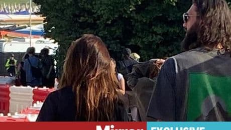 'Smitten' Andy Carroll and Lou Teasdale put holiday spat behind them as enjoy Glastonbury