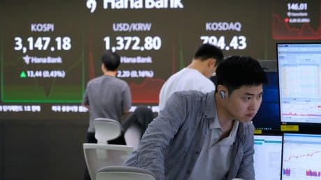 Asian shares mostly gain after big tech rally on Wall Street