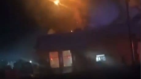 Moment Domino's Pizza restaurant explodes into fireball as car crashes into building