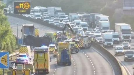 M25 closed in rush hour after lorry crashes and overturns