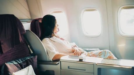 'I've never paid for a flight upgrade and neither has my partner - here's how we do it'
