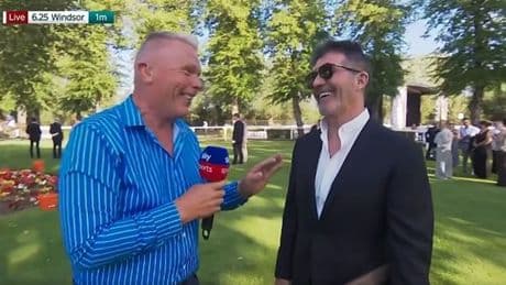 Simon Cowell takes Sky Sports presenter by surprise admitting he's a 'huge fan' on day out