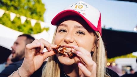 Foodies flock to world's biggest chicken wing festival complete with 'Lava Wing Challenge'