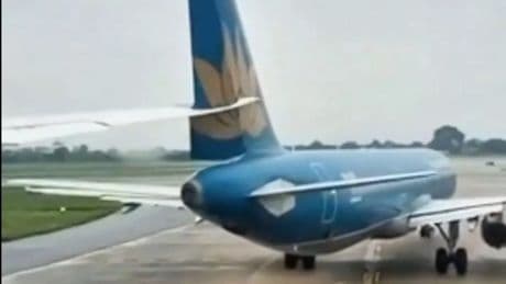 Boeing plane collides with aircraft and slices tail as passengers watch in horror