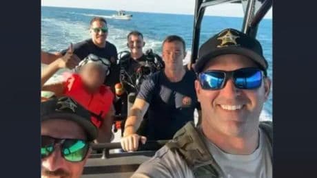 Missing teen rescued a mile off the Florida coast clinging to his body board