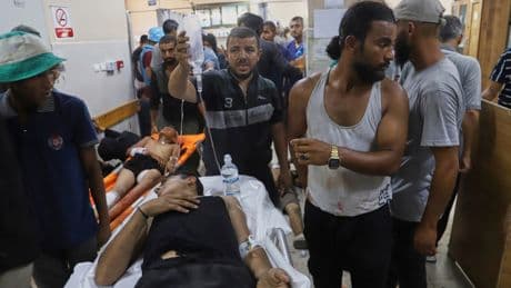 22 Palestinians killed in Gaza as Israeli forces fire on crowds at food aid sites, medics say