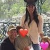 Prince Harry and Meghan Markle's Disneyland family photo sparks wild conspiracy theories: Royal fans claim children were added with AI and a mystery 'disembodied' hand is holding up Lilibet