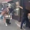 Instant karma! Shocking moment teen gang hurl chairs at restaurant waiters - before one of the attackers gets more than he bargained for
