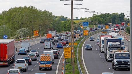 Major motorway closed with drivers left stranded after crash as bank holiday motorists face huge delays