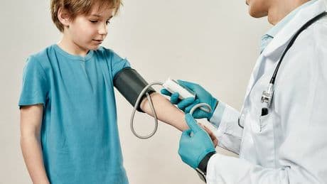 Children should have their blood pressure monitored from the age of 7 to prevent fatal midlife heart disease, experts say