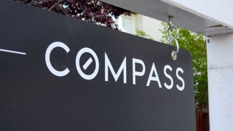 The fight over real estate listings heats up as Compass targets 'Zillow ban' in new lawsuit