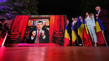 AP PHOTOS : Hard-right candidate Simion decisively wins first round of Romania’s presidential redo