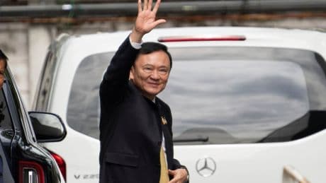 Former Thai Prime Minister Thaksin Shinawatra says he has been acquitted of royal defamation