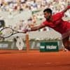Novak Djokovic earns his 100th career French Open victory by overwhelming Cam Norrie