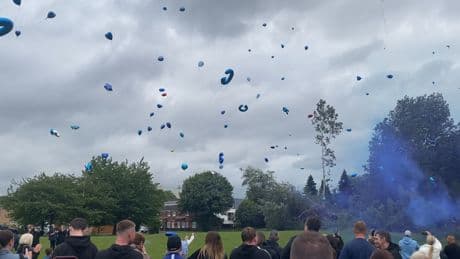 Greg Monks' sister says it gets 'harder every day' as hundreds turn out for emotional balloon release