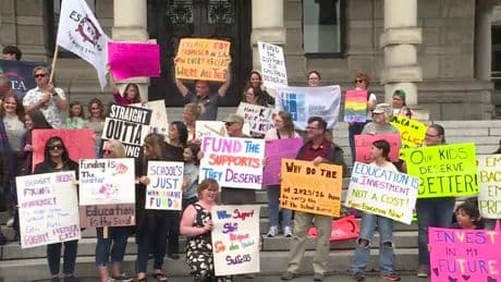 Warning of a ‘crisis’ in public education as parents rally at B.C. legislature