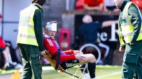Aberdeen star suffers nasty head injury after being struck by a seat thrown by his own fan