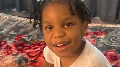 Tiny feet seen dangling out of blanket before little boy, 5, found dead bin