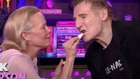Pamela Anderson and Liam Neeson get touchy-feely in flirty interview as fans left stunned