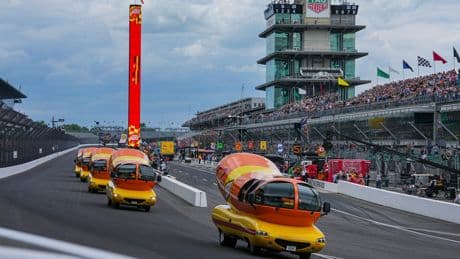 Hot diggity dog! Wienermobiles put on riveting race in Wienie 500 at Indianapolis Motor Speedway
