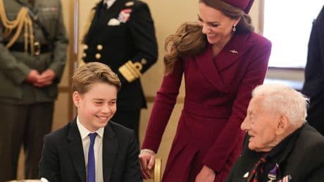 Prince George carries out biggest royal duty yet by charming veterans at VE Day party