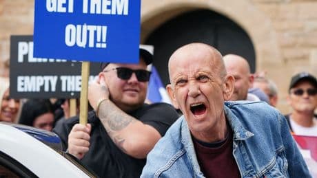 Protesters clash outside asylum hotels as tensions over migration flare