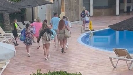 Watch the moment sunbed wars take place at iconic hotel used to film ITV’s Benidorm as Brits swarm the pool