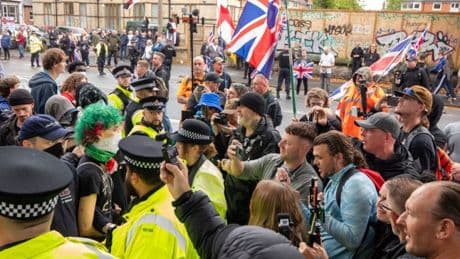 Migrant hotel protester arrested for ‘indecent exposure’ amid dissent across country
