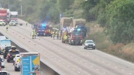 M25 closed and two-hour delays after lorry fire