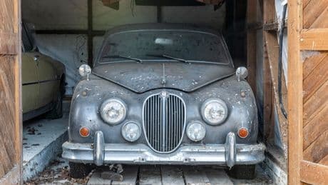 Barn full of dust-covered motors including Jaguars, rare MG & iconic 90s sports car hit market for eye-watering sum