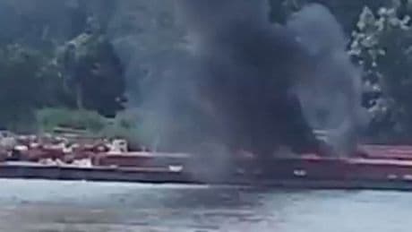 Helicopter crashes into barge as two people die in fireball smash