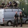 Three women are arrested on terror offences after van slammed into defence manufacturer