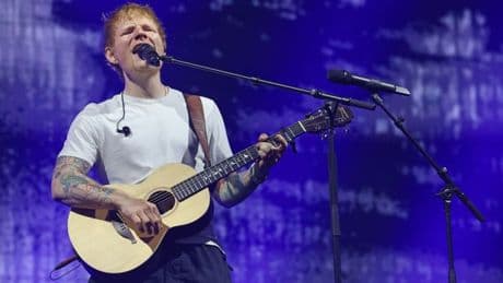 Ed Sheeran suffers a fall on stage during first gig of European tour