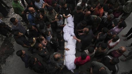Israeli strike on school-turned-shelter kills 23 as Arab mediators seek long-term Gaza truce