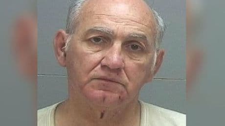 George Zinn, present at Kirk shooting, charged with possession of child sex abuse material