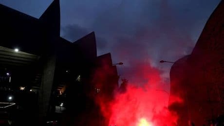 PSG fans riot in Paris streets as police confront car-burning supporters