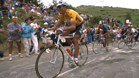 Subir sentado, como Miguel Indurain