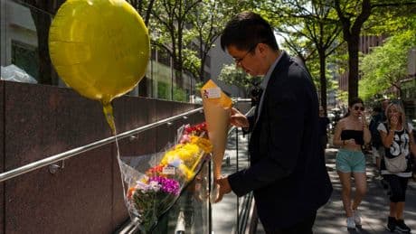 Victims of New York City shooting include a police officer and an executive at investment firm