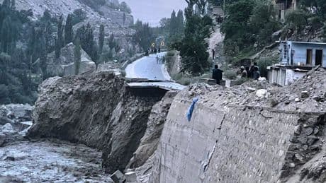 Flash floods triggered by heavy rains kill at least 49 people in northwestern Pakistan