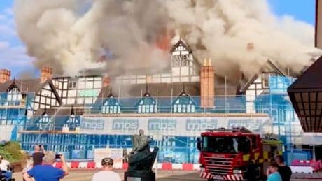 Iconic 800-year-old Raven Hotel in flames as roof caves in on historic site